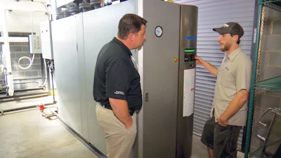 An operator adjusts the Miura LX 200 SG, which runs four days a week for 20 hours a day to produce about 360 barrels of beer per week at Yee-Haw Brewing Co.