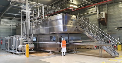 Hiperbaric’s 525 in-bulk machine processes twice the amount of beverage product per cycle than traditional in-pack HPP equipment.