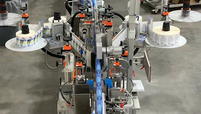 Dual-head labeler applies either wraparound or front-and-back labels.