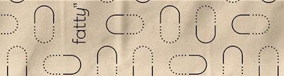 The branded 'pill pattern' is used on the tape and various decorative spots on the pack. the design is meant to recall the C15:0 chemical name for Fatty 15.