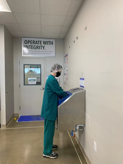 An automatic handwashing station and signage remind GTI staff that a food safety culture is mandatory. Photo courtesy of GTI.
