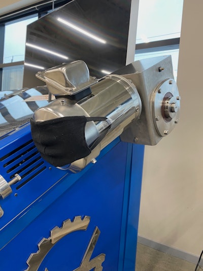 Though this picture was initially taken as a joke during pandemic-related mask requirements, it actually illustrates the sanitation problems that can occur with the fans in electric motors carrying microbes to food processing areas.