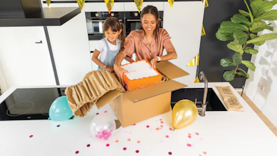 Waved paper pads serve both as blocking and bracing for a delicate carton board cake box, and insulation to keep things cool.