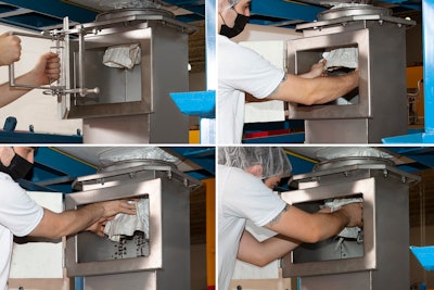 An operator opens an access door and pulls the bag outlet spout through the sealing ring before untying the spout's drawstring.