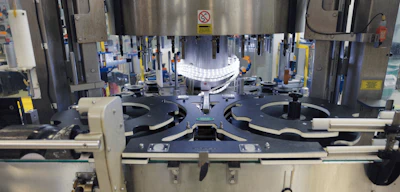 Labeled starwheels and other changeparts on a filler at Beam Suntory’s Frankfort location.