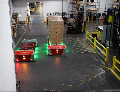 The lidar-based IAV travels on a preprogrammed path through the facility, carrying pallets from the packaging line to the warehouse.