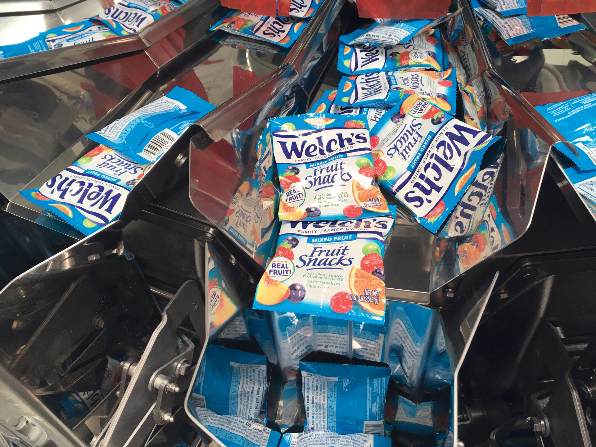 Pouched Welch&rsquo;s Fruit Snacks are ready for cartoning at PIM Brands.