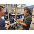 Zenni Director of Distribution and Facilities Simon Goh (right), talks about the deployment now underway with OSARO’s Bryan Yong, a Senior Solutions Engineer at the AI robotics company's San Francisco Robot Lab.