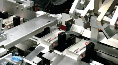 Tuck tab flaps are subducted under a metal flange after erecting for easier loading of trays of ammunition.