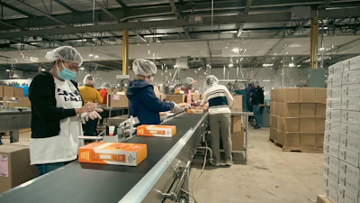 Operators case-pack squeezable smoothie products for club store distribution.