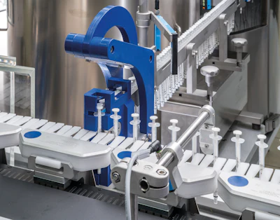 Five pipettes are loaded onto one of the Beckhoff transport system’s movers.