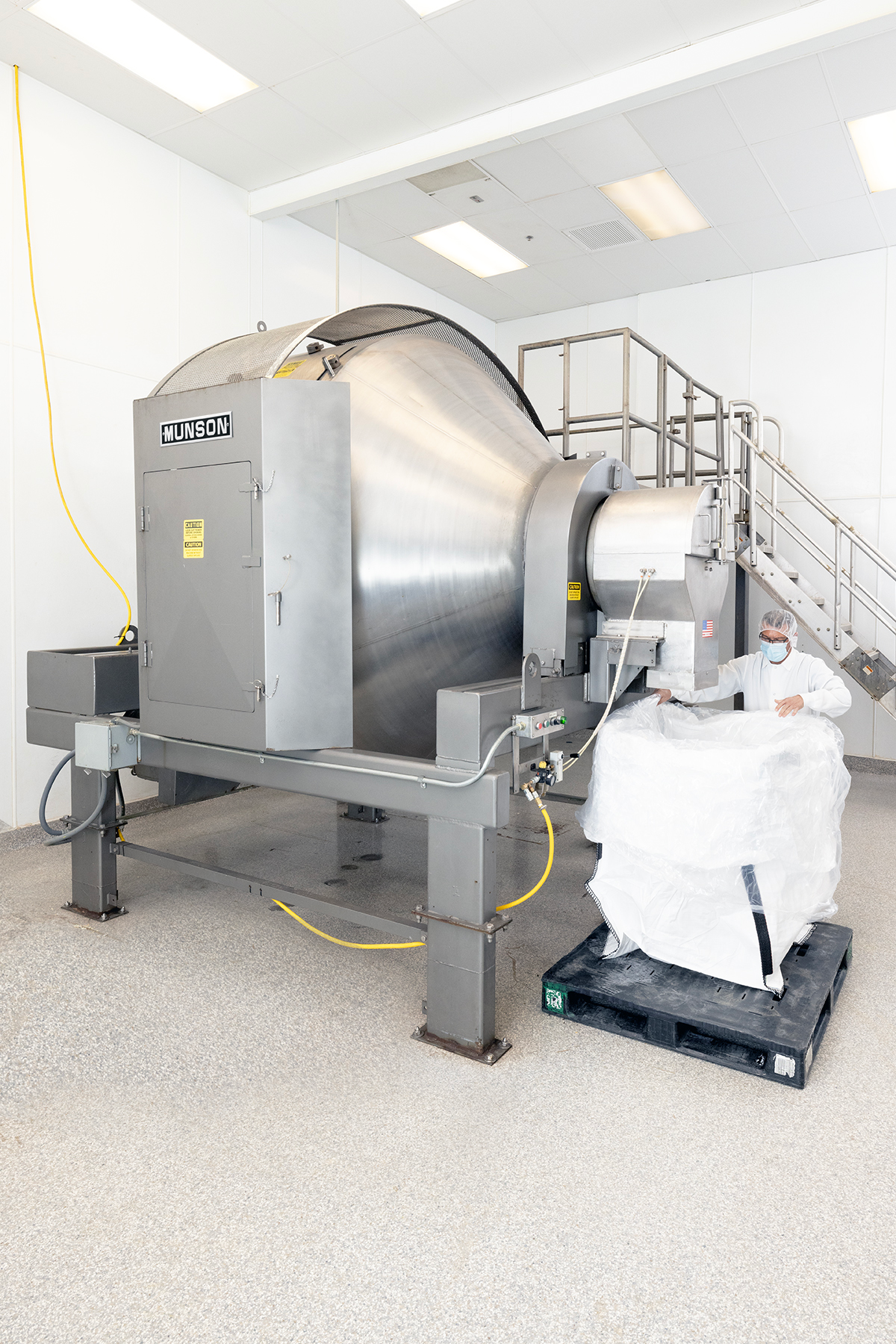 The factory-refurbished 700-TS-90-SS Rotary Batch Mixer inside Phoenix Custom's facility.