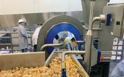 Flavoring is done immediately ahead of bagging with one of four TNA seasoning systems. The latest of the four, the TNA intelli-flav OMS 5.1 seasoning system, allows for the most consistent coverage without costly ingredient losses.