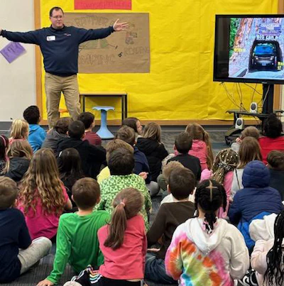 Todd Douthit presents the TICCIT program to second graders.