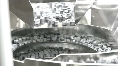 The stoppering station uses a vibratory bowl that does not need to be changed for stoppers.