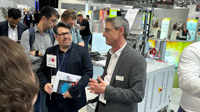 Melichar (left) and Gerardo Gonzalez (right) describe the REA JET late-stage customization solution.