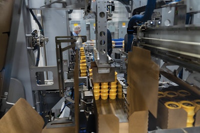 A key goal in the new approach to multipacking was to make automated case packing a possibility. Shown here is the wraparound case packer now running on both lines.
