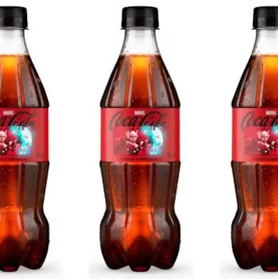 Coca-cola's new limited-edition Marvel collaboration bottles feature an illuminating Thor's hammer illustration.