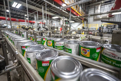 Crider Foods cans on a conveyor