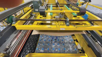 A PAI top-down palletizer anchors the line.