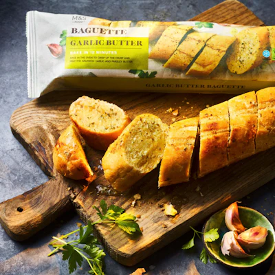Marks & Spencer's new paper packaging for garlic baguettes is expected to eliminate about 5.5 million units of plastic packaging per year.