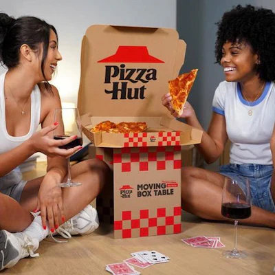 Pizza Hut introduced The Moving Box Table after a survey revealed many people eat pizza on the floor while moving.