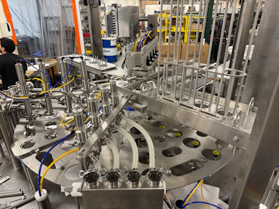 The Orics R-50 rotary cup filling system has dual filling stations for products like yogurt that also include a fruit puree on the bottom.