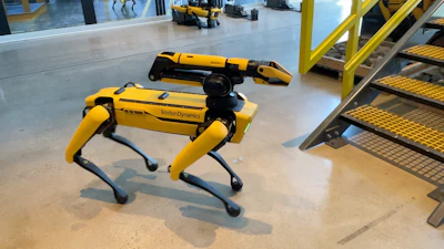 This is Spot with the extendable arm and gripper prior to demonstrating how easily it can move up a flight of stairs.