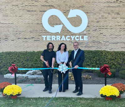 (l. to r.) Tom Szaky and Jen Eichorst of TerraCycle and Aurora, Ill., Mayor John Laesch cut the ribbon at the grand opening of TerraCycle’s new North American Operations Center in Aurora.
