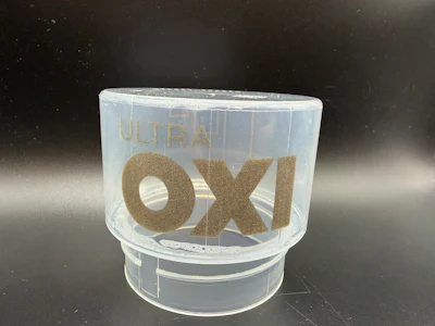 Logo and branding on a recently emptied cap.