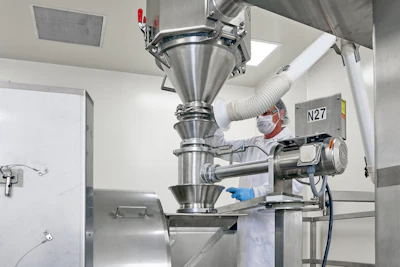 Ingredients are transferred from drums to the mixer in a sterile, dust-free manner, isolated from the plant atmosphere.