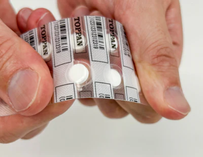 Samples of push-through blister packs with brittle lidding material.