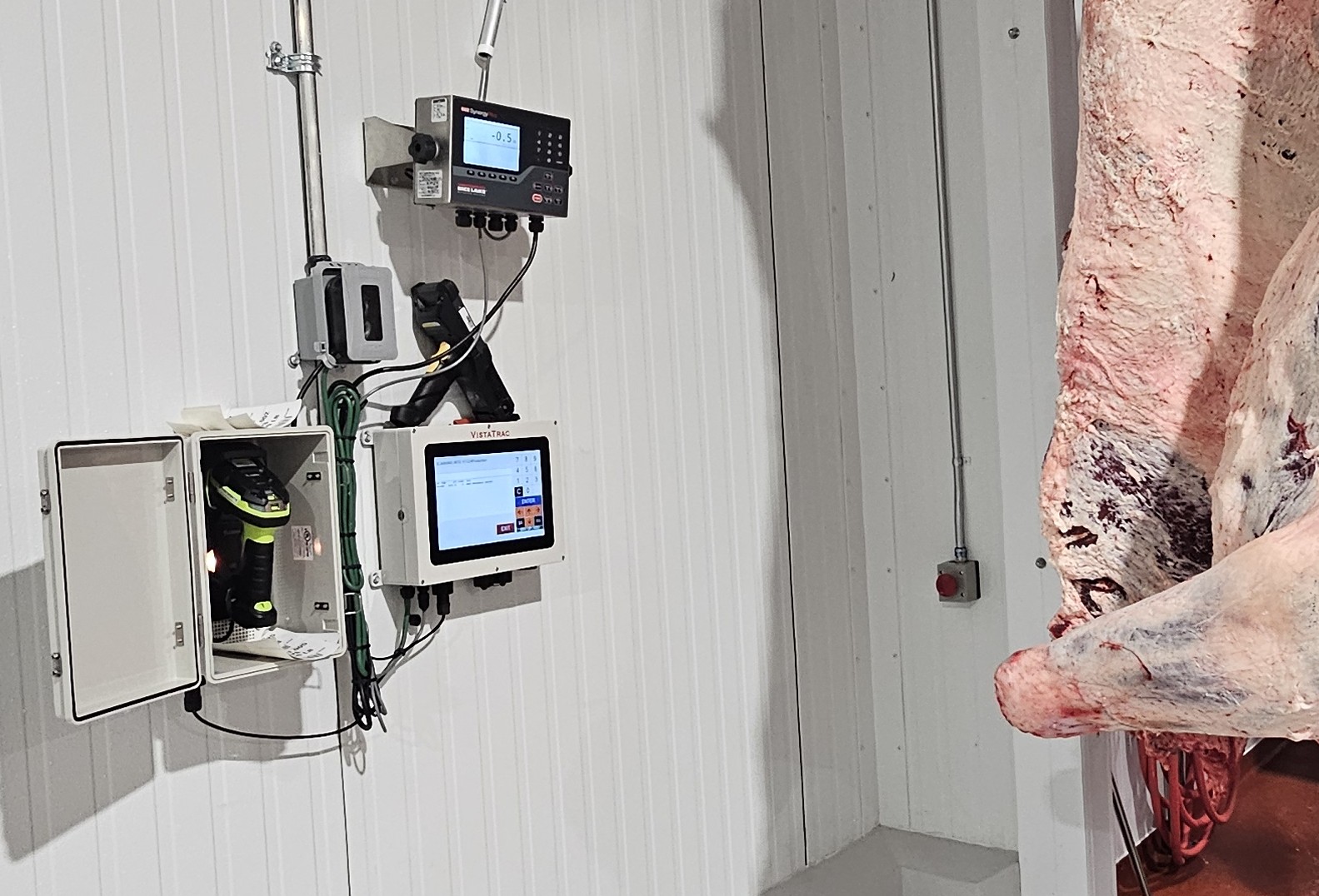 A VistaTrac TracBox computer at Bar-W's cold weight station automatically records carcass weights after time in a cooler.